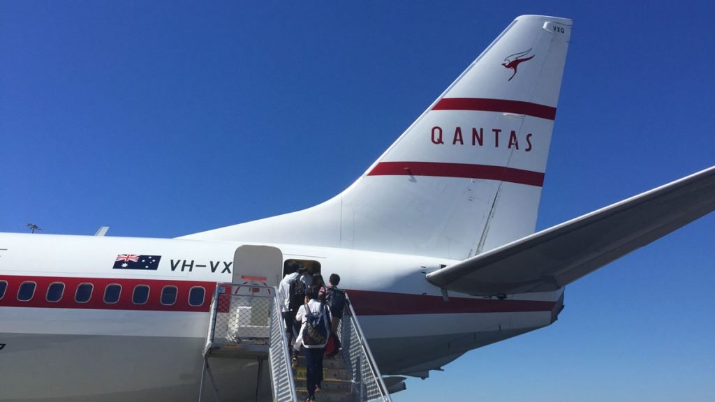 people boarding an airplane