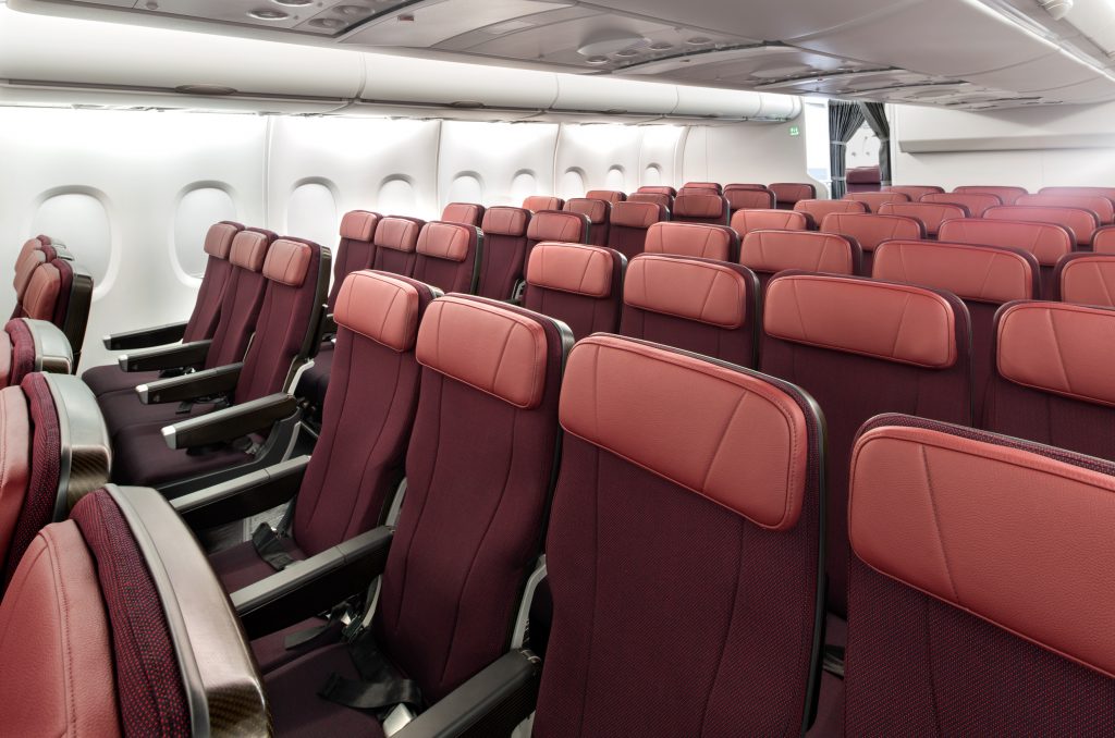 rows of seats in an airplane