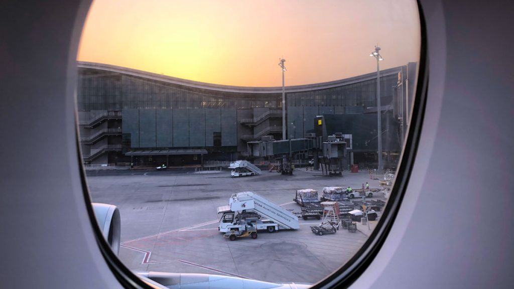 a view of a building from a window of an airplane