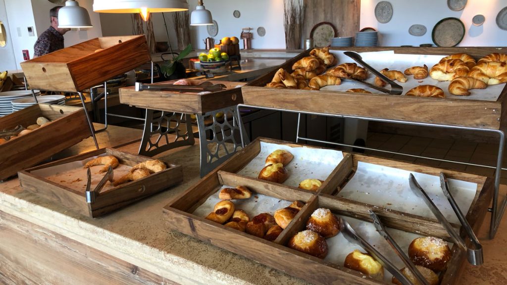 a trays of pastries on a counter