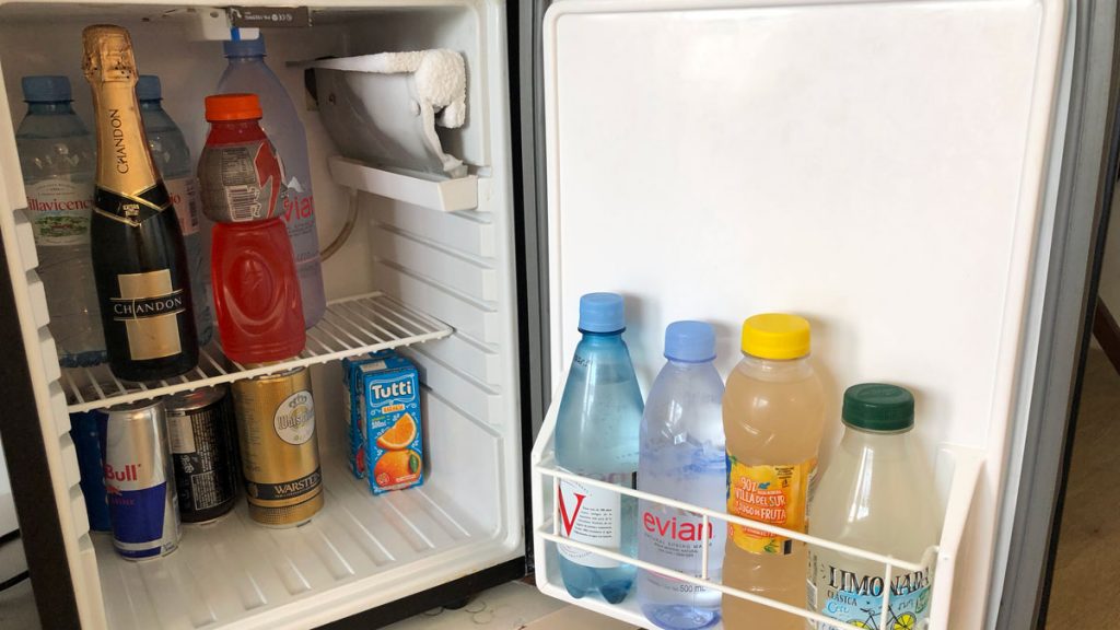 a refrigerator with drinks and beverages