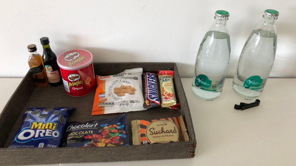 a tray of food and a bottle of water