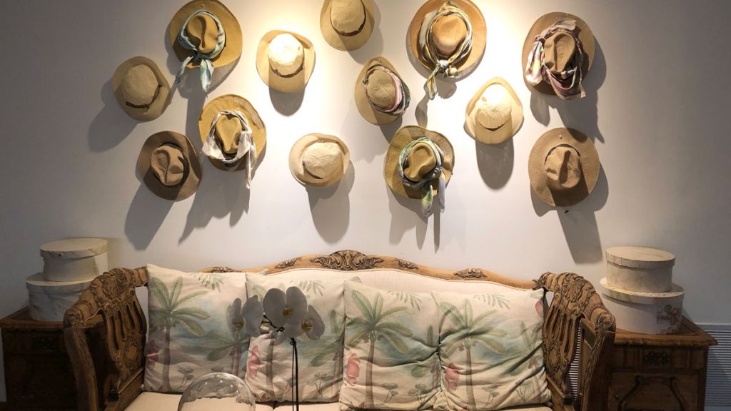 hats on a wall