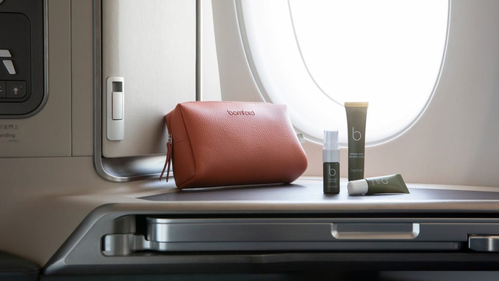 a small brown bag on a table next to a window