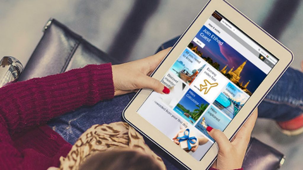 a person holding a tablet