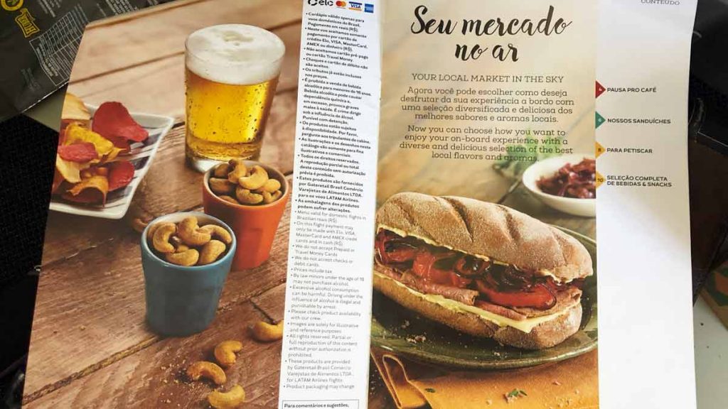 a magazine with a sandwich and beer