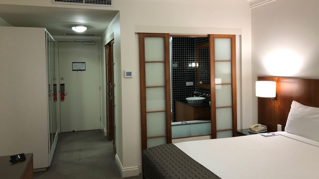 a bedroom with a double door