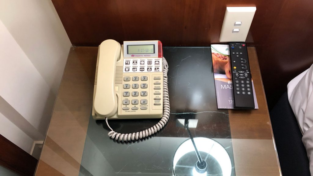 a telephone on a glass table