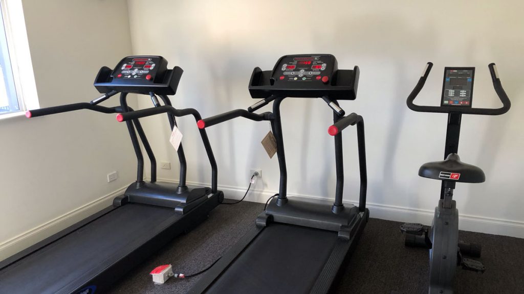 tread treadmills in a room