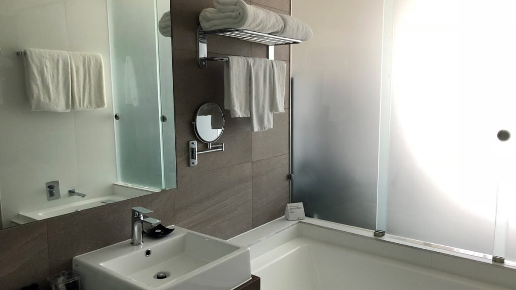 a bathroom with a bathtub and a sink