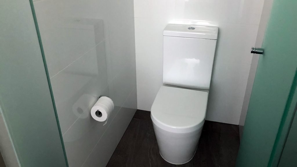 a toilet in a bathroom