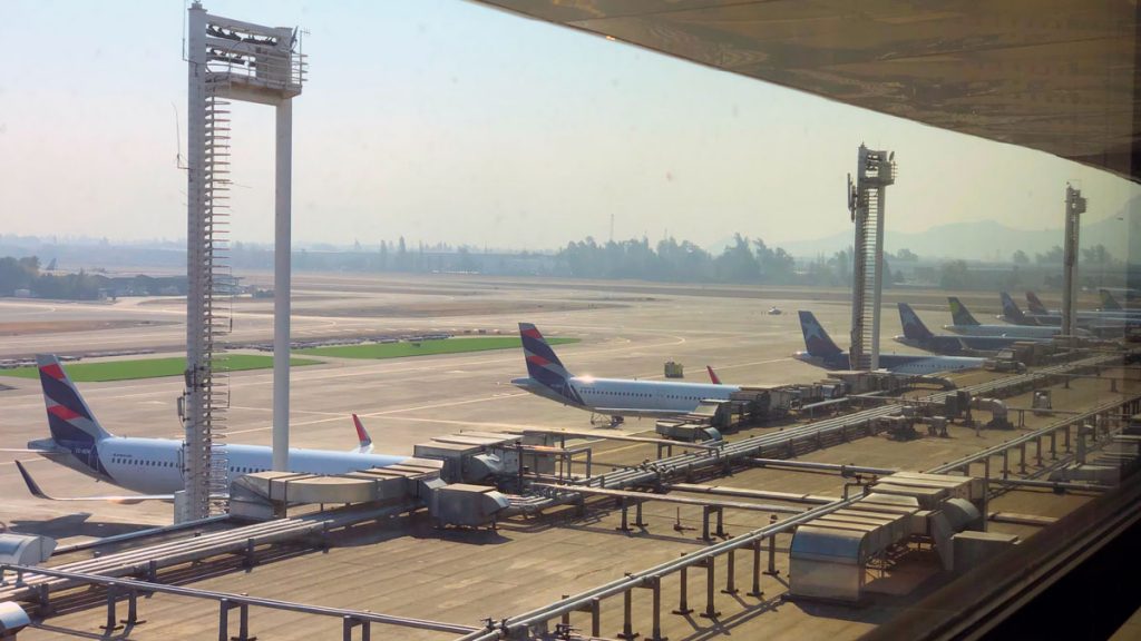 an airport with airplanes on the ground