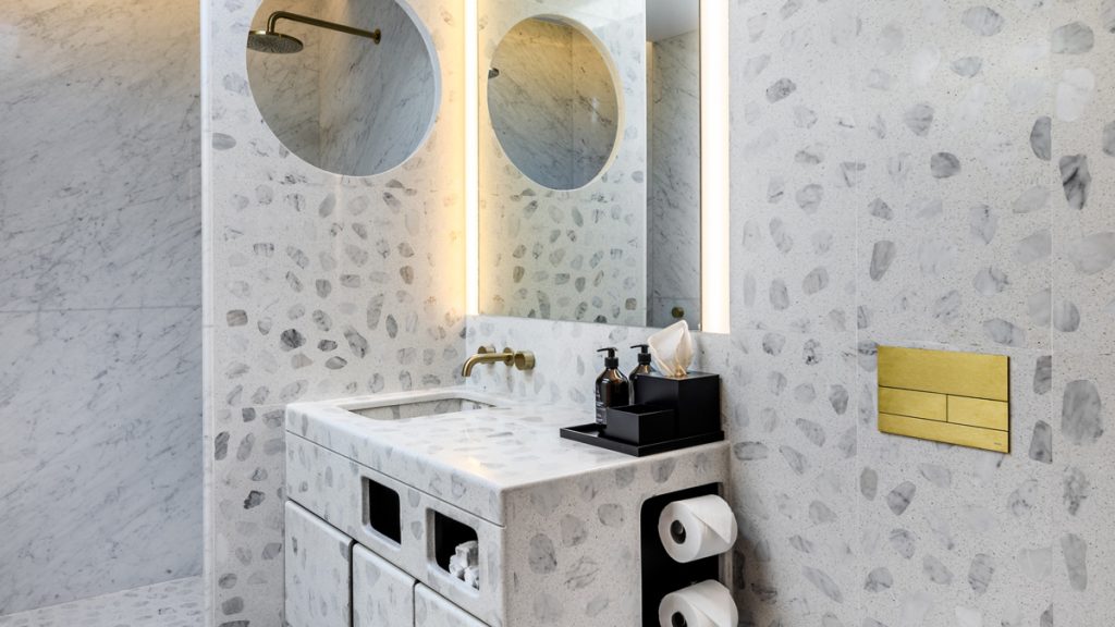 a bathroom with a sink and a mirror