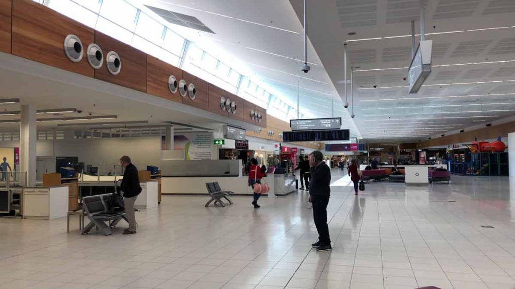 people in a large airport