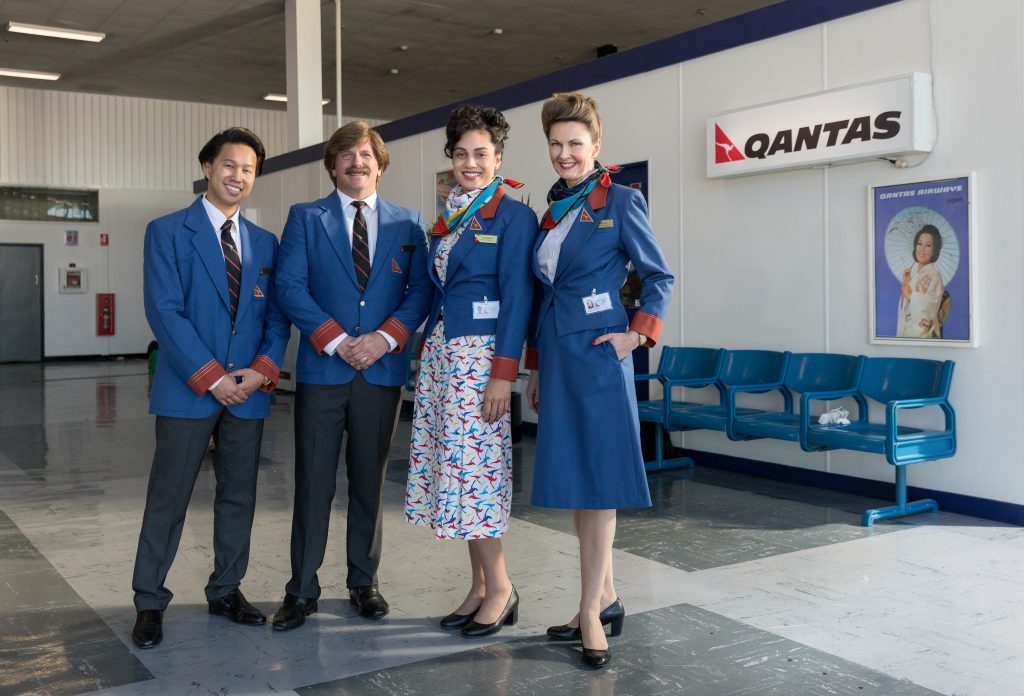 a group of people in blue uniforms