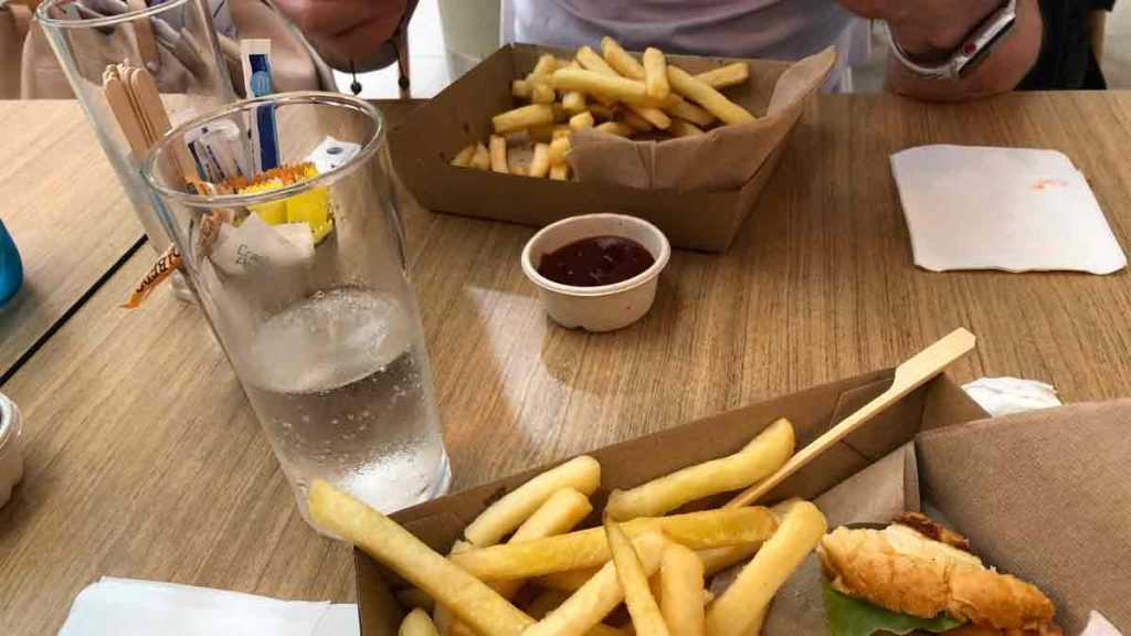 a table with food and a glass of water