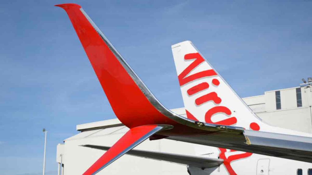 a close-up of a tail fin of a plane