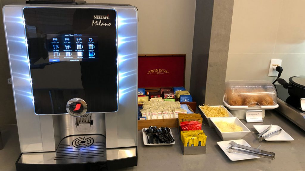 a machine next to a tray of food