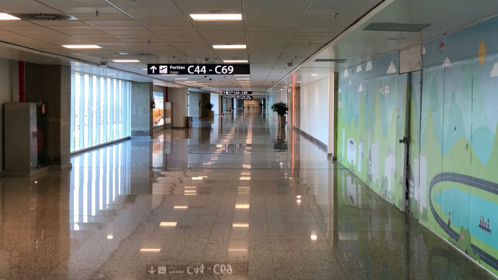 a hallway with signs on the wall