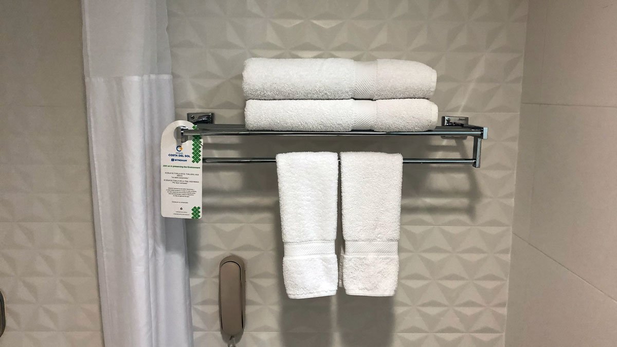 a towel rack with towels on it