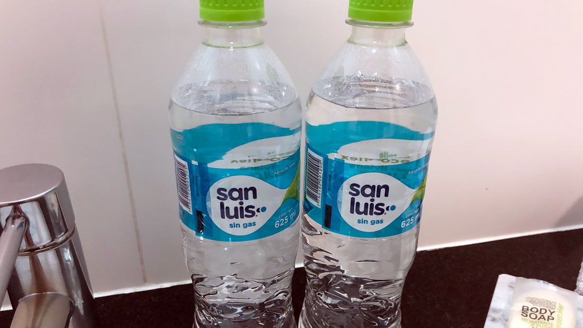 two bottles of water on a table