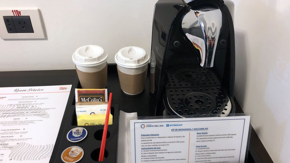 a coffee machine and coffee cups