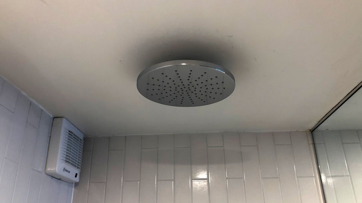 a shower head on a ceiling