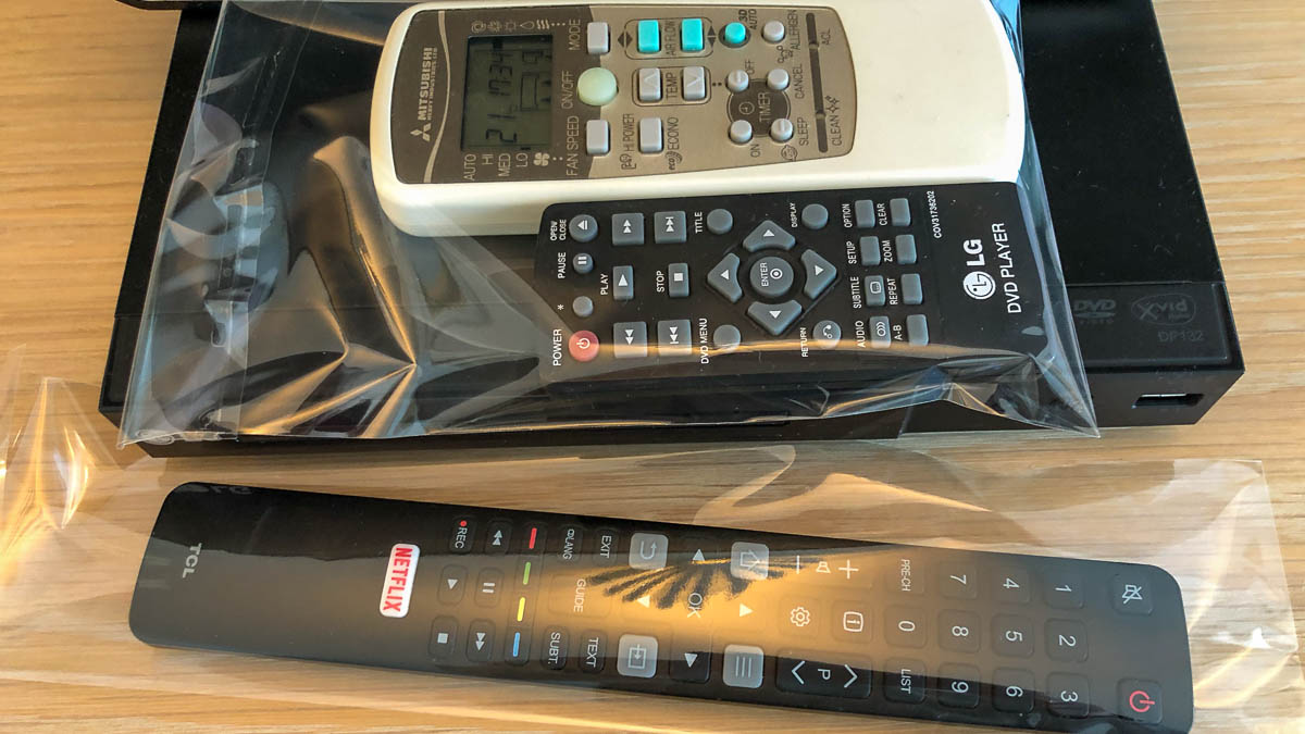 a remote control in a plastic bag