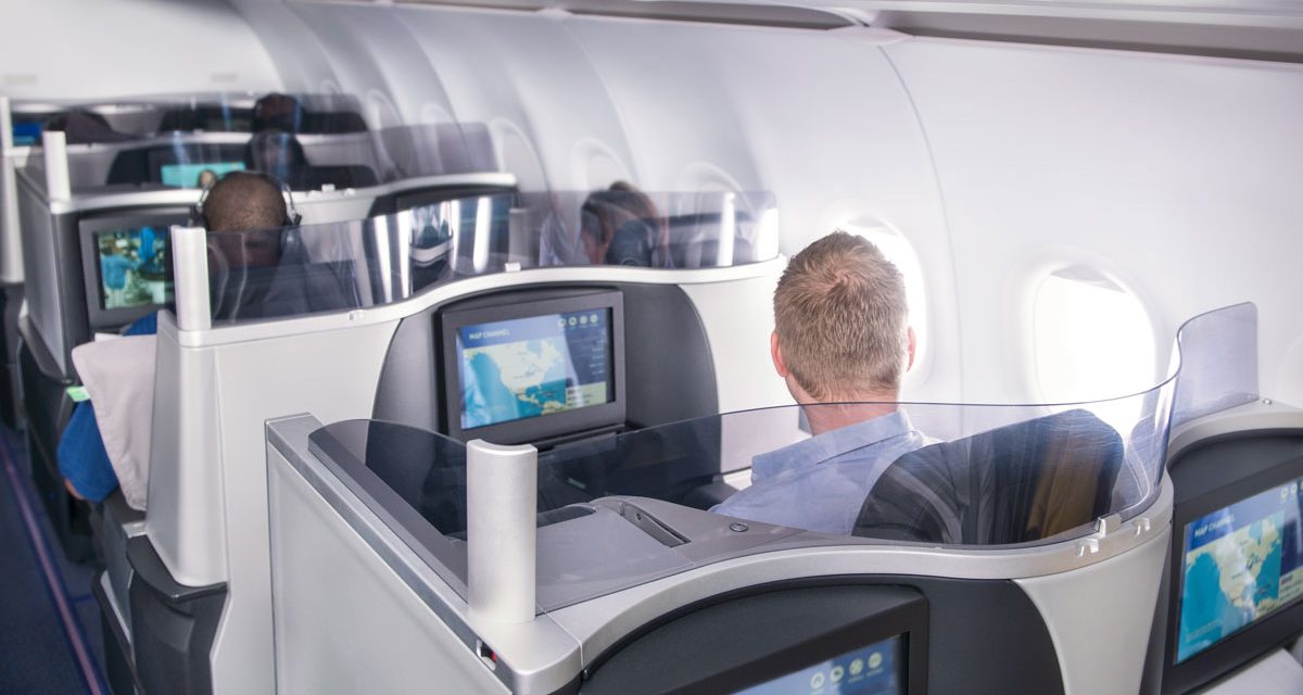 a man sitting in an airplane