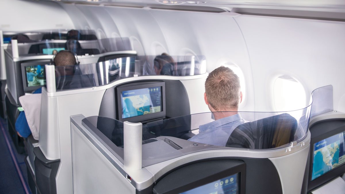 a man sitting in an airplane