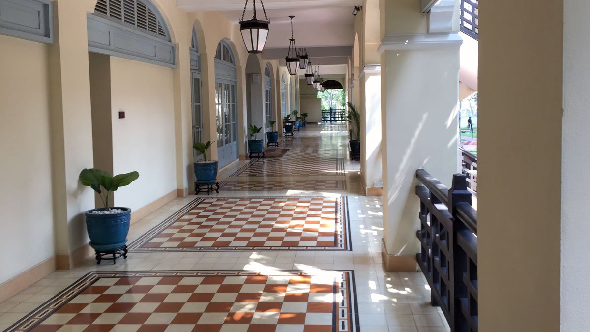 a hallway with a checkered floor