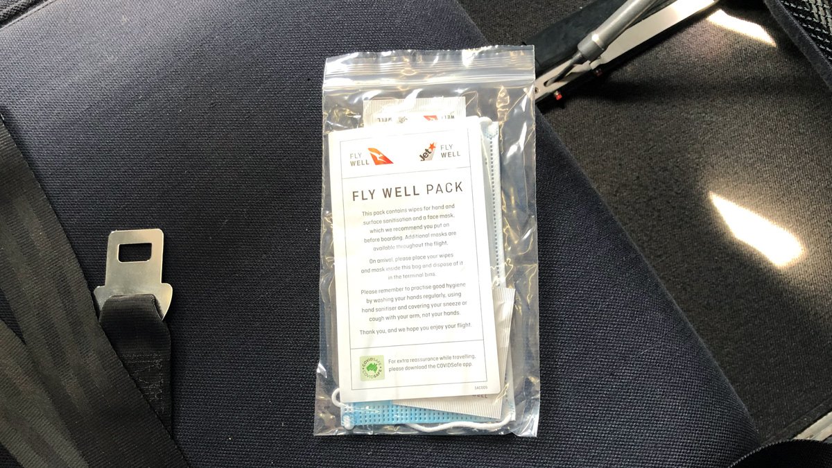 a package of face masks on a seat