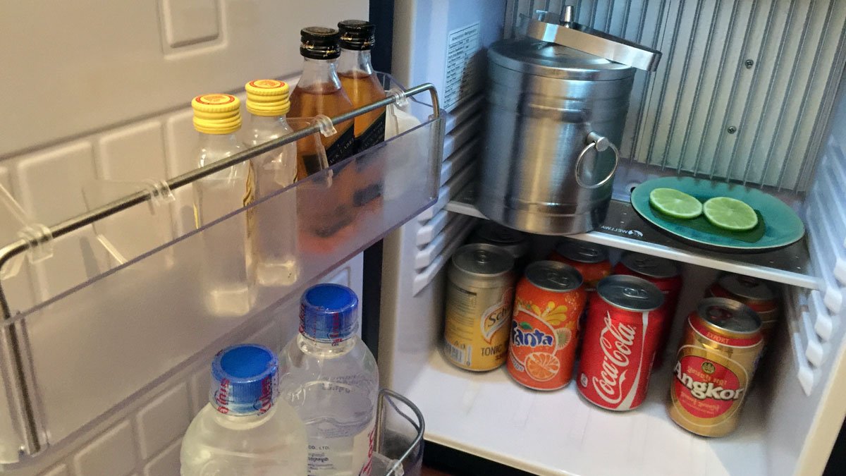 a refrigerator with drinks and beverages