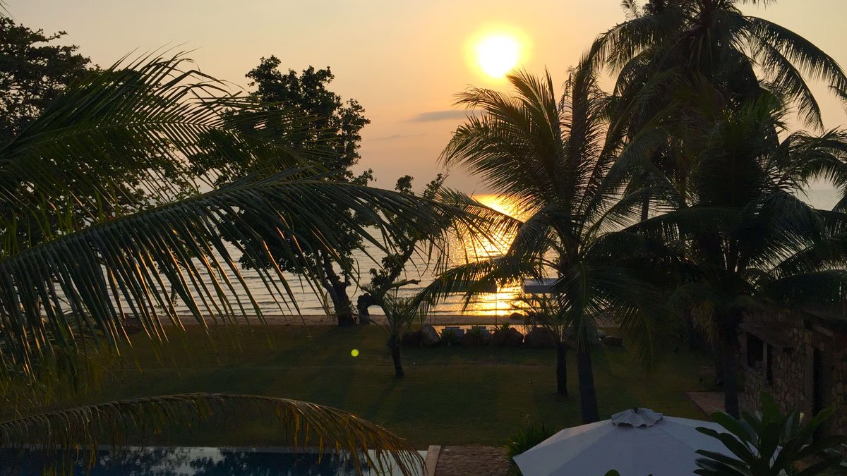 a sunset over a beach