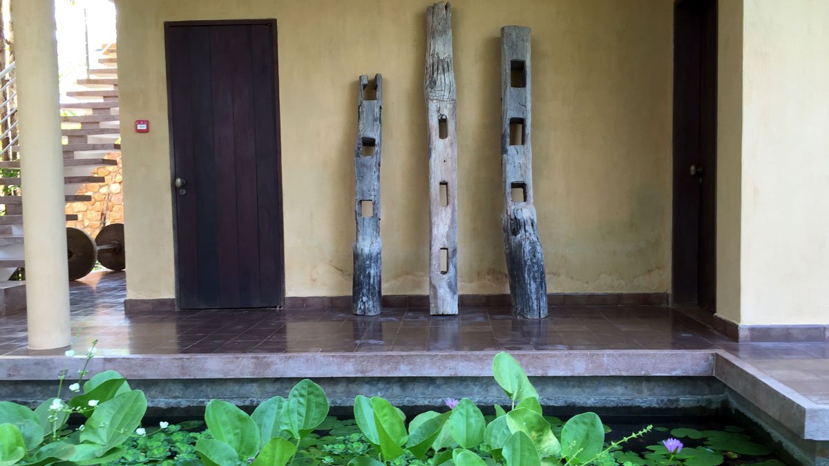 a group of wood pieces on a porch