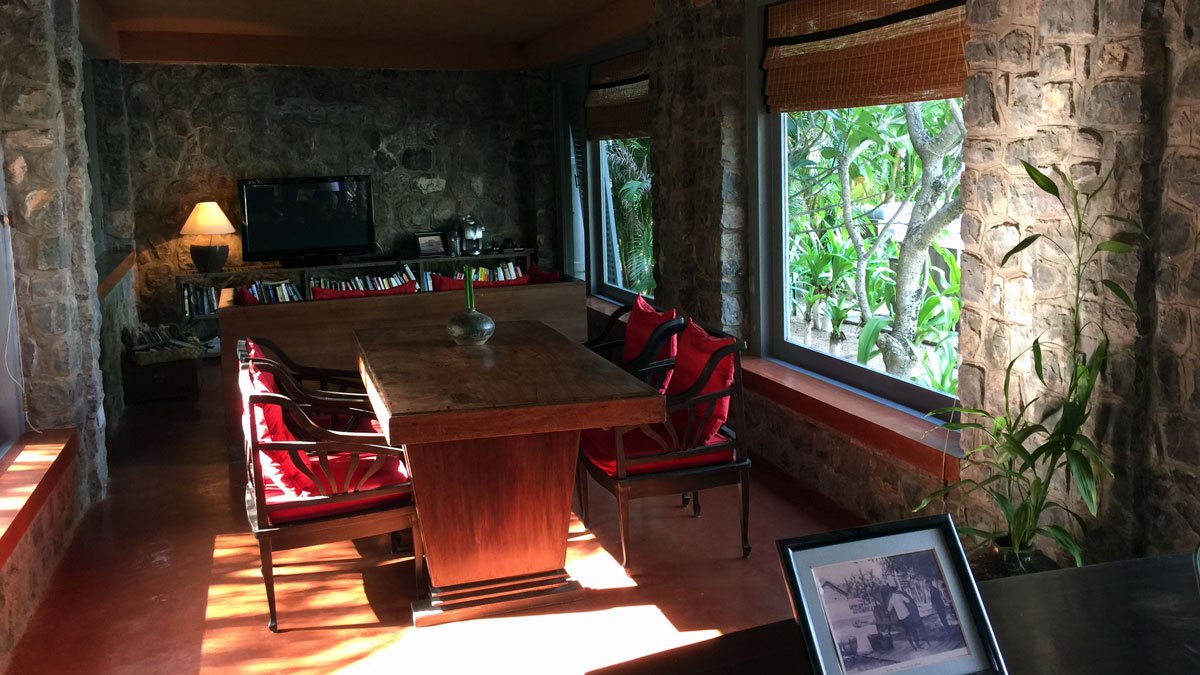 a room with a table and chairs