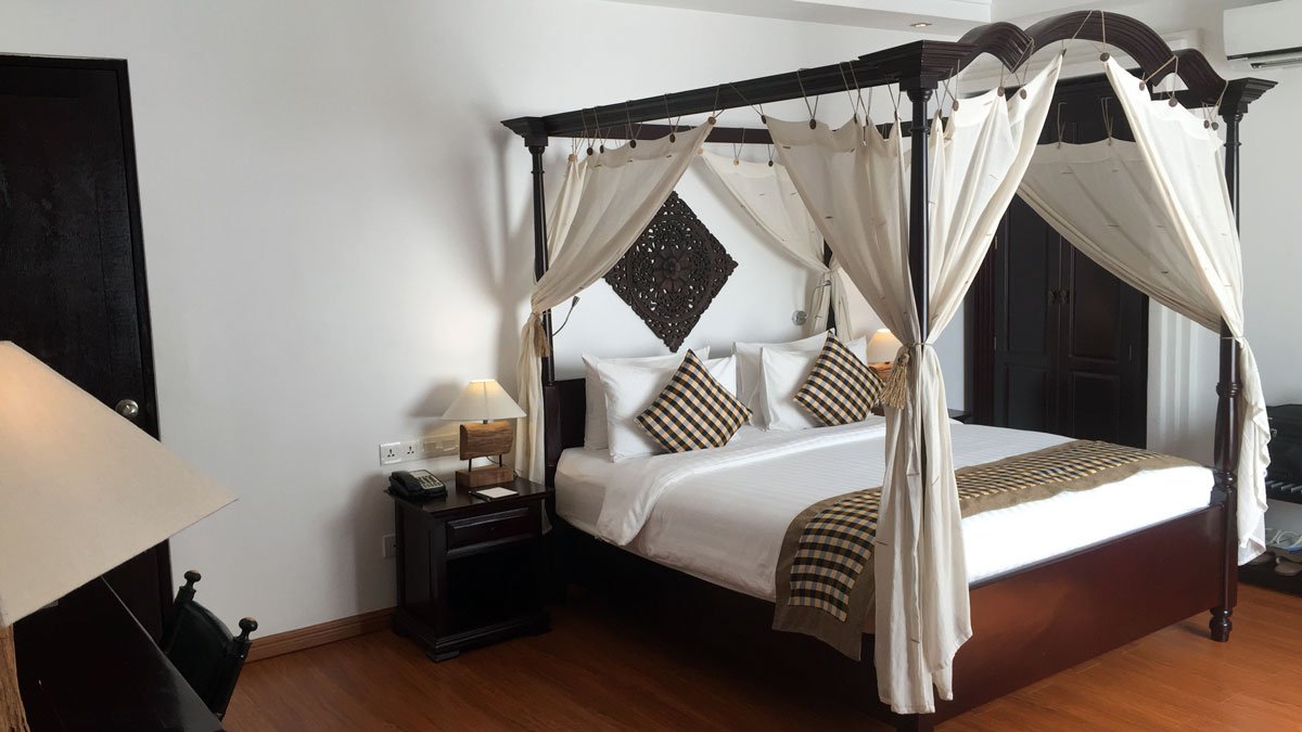 a bed with a canopy over it