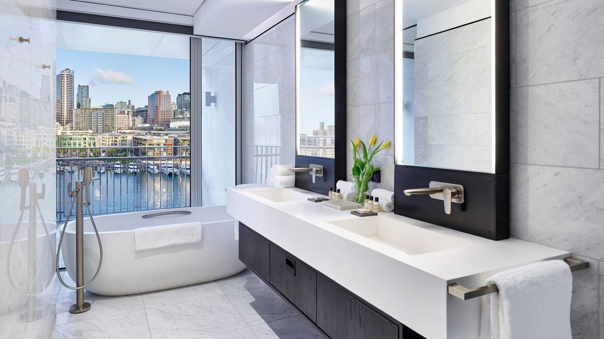 a bathroom with a tub and sink