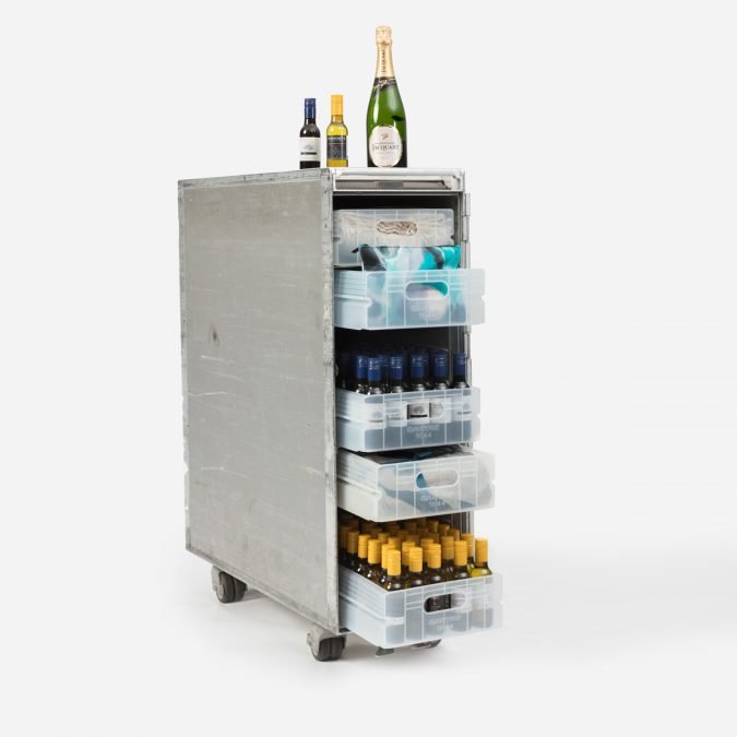 a cart with bottles on top of it