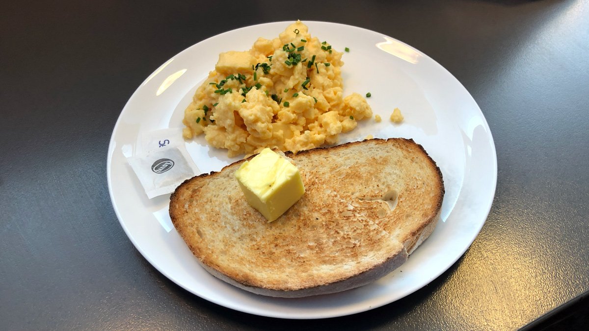 a plate of food with butter on top