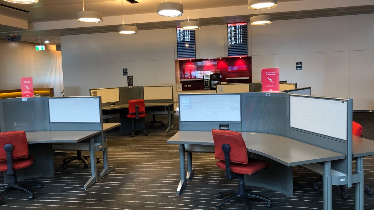 an office with desks and chairs