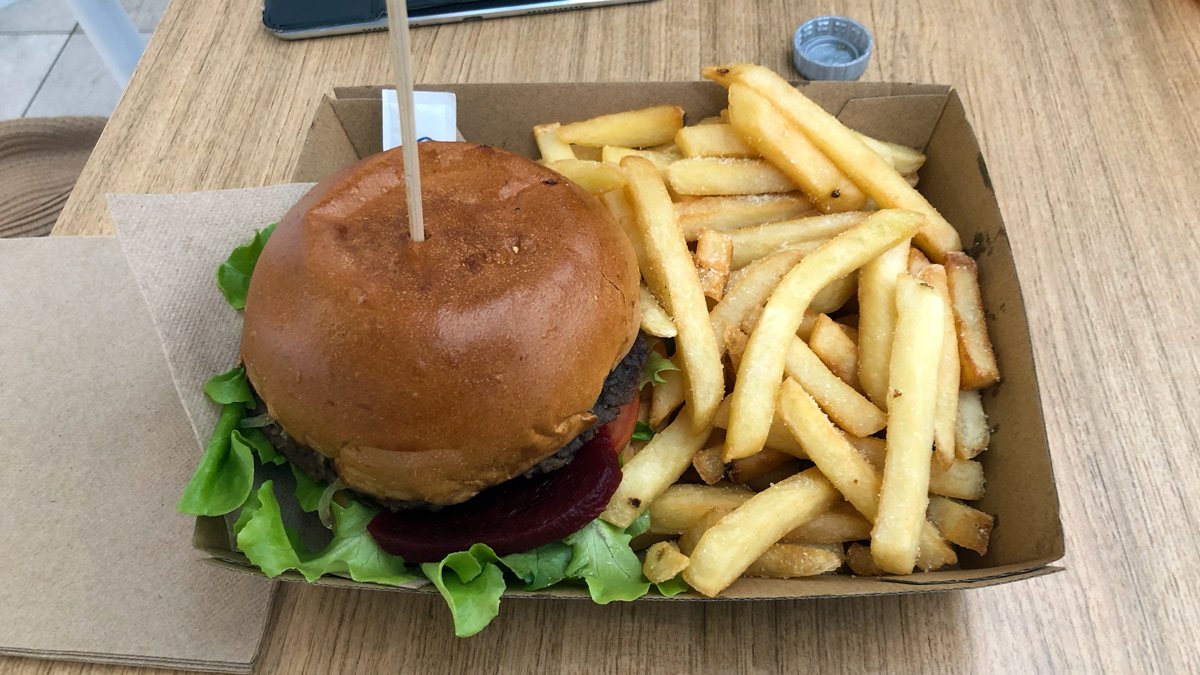 a burger and fries in a box