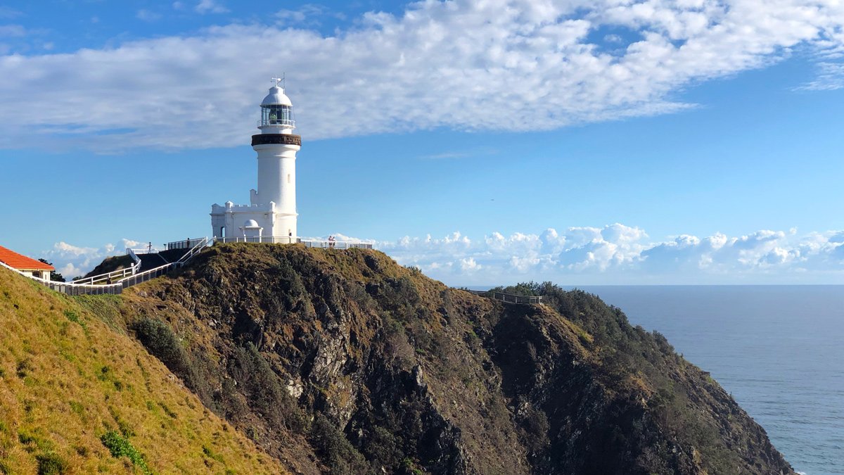 a lighthouse on a cliff