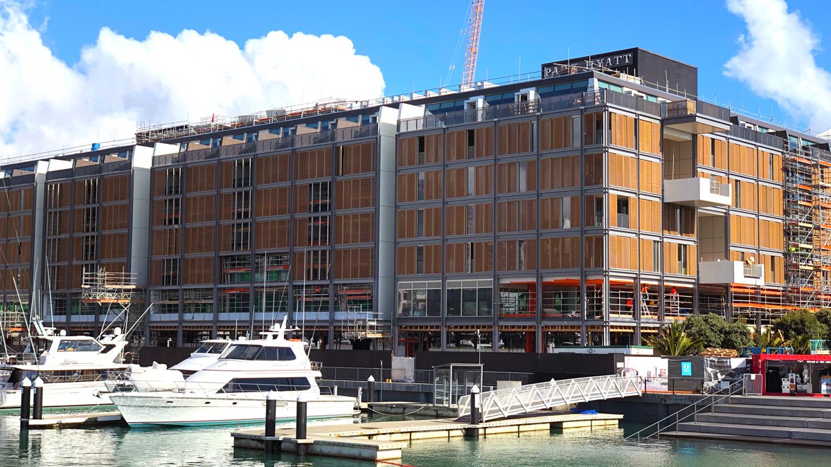 a building with a boat in the water