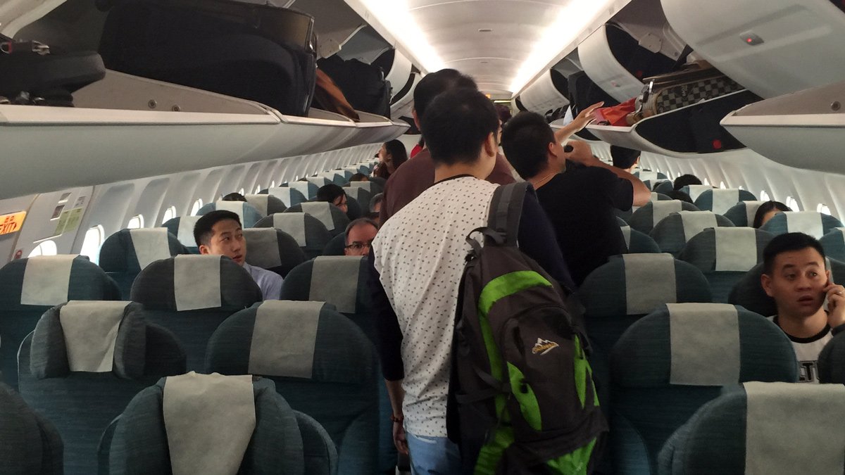 a group of people on an airplane