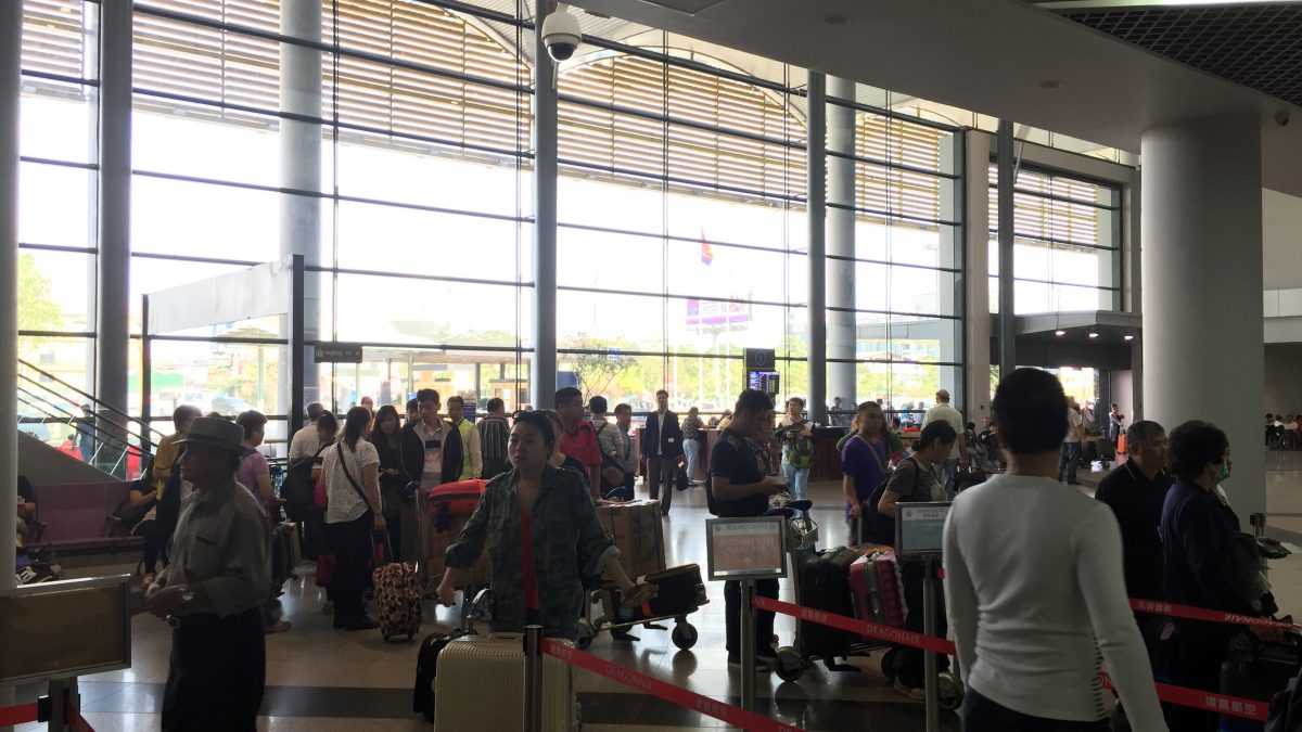 a group of people in a terminal