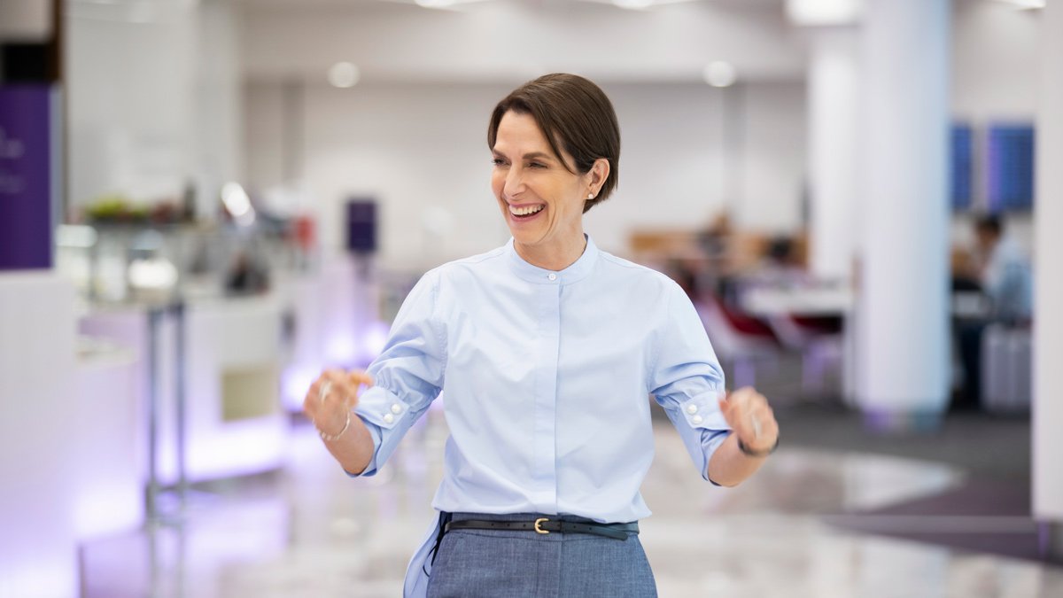 a woman in a blue shirt