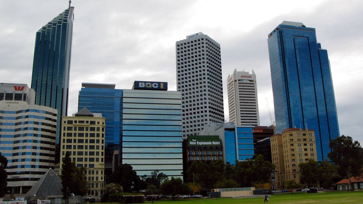 a group of tall buildings in a city