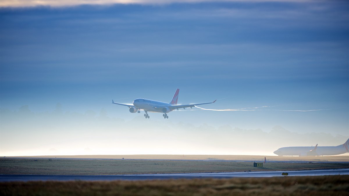 an airplane taking off from a runway