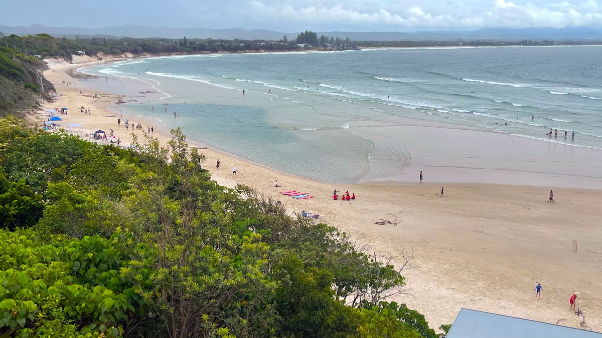 a beach with people on it